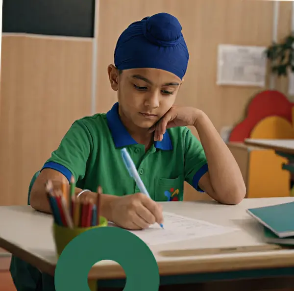 Kid writing on a paper